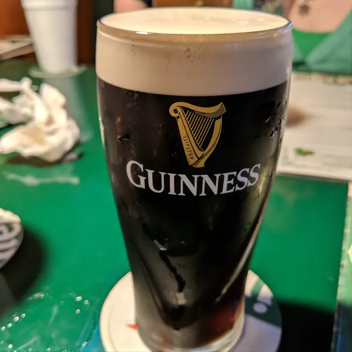 A freshly poured pint of Guinness on tap