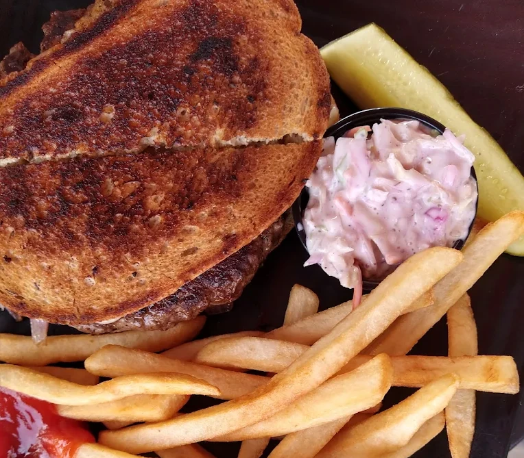 Fitzgerald's patty melt with caramelized onions and Swiss on grilled rye